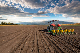 Why are modern farmers switching to automatic steering?